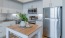 Kitchen with stainless steel appliances