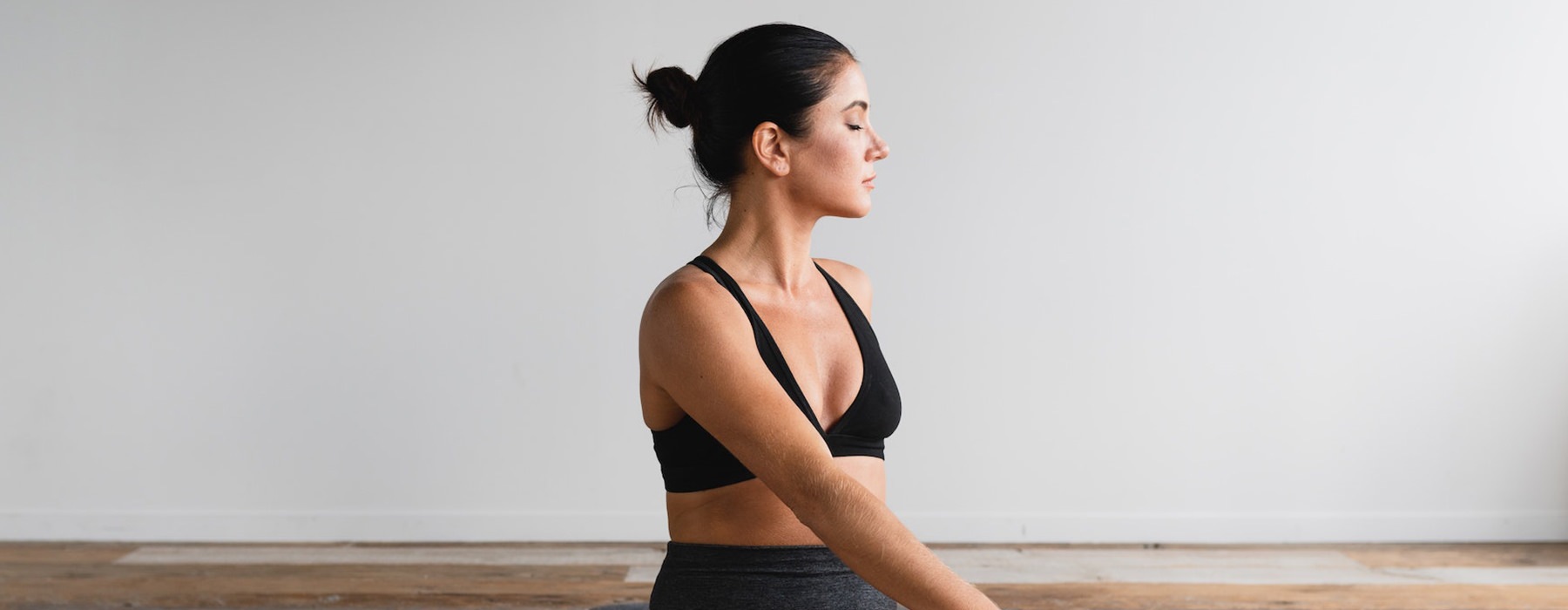 a woman in a black tank top