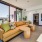 large room with couches 