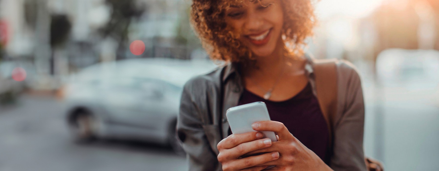 a woman holding a phone